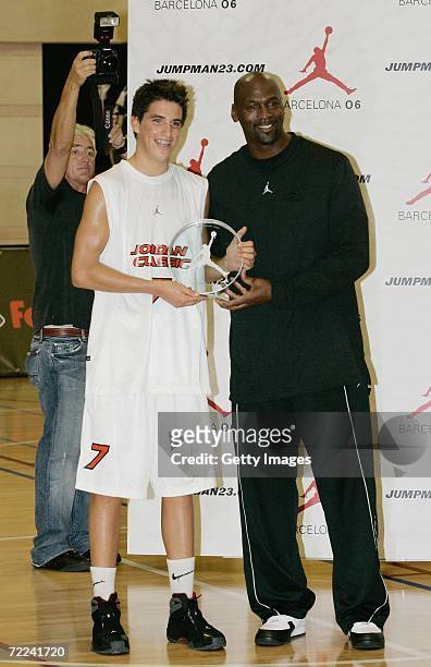 Michael Jordan gives the MVP award of the Jordan Classic Game to Jorge Santana on October 22, 2006 at the INEF Centre in Barcelona, Spain.