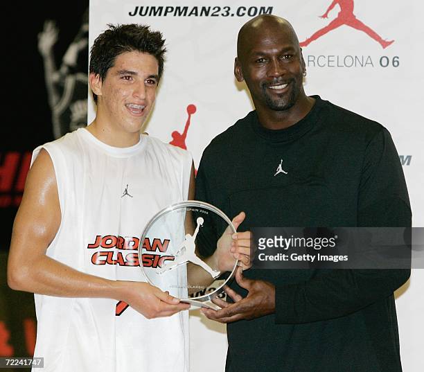 Michael Jordan gives the MVP award of the Jordan Classic Game to Jorge Santana on October 22, 2006 at the INEF Centre in Barcelona, Spain.