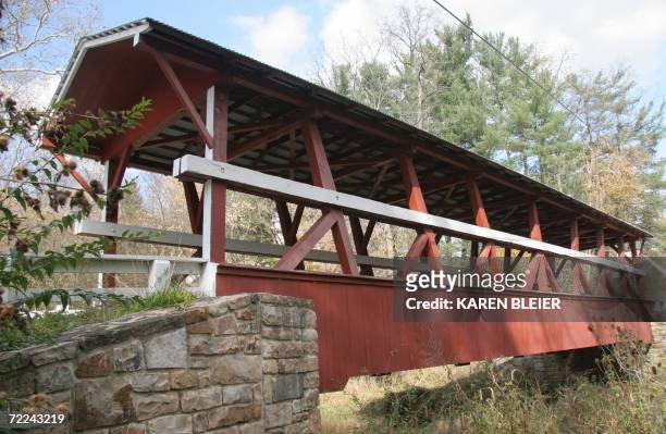 Bedford County, UNITED STATES: This 21 October, 2006 photo shows the Colvin covered bridge located in Bedford County, Pennsylvania. The Colvin bridge...