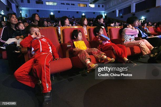 Children watch the "Mozart's Magnificent Voyage" children's concert held to mark the 250th anniversary of the birth of Mozart on October 22, 2006 in...