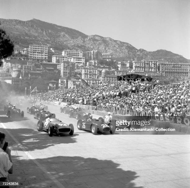 The start of the Monaco Grand Prix, Monte Carlo, 22nd May 1955. Juan Manuel Fangio and Stirling Moss in the Mercedes W196 bracket Alberto Ascari's...