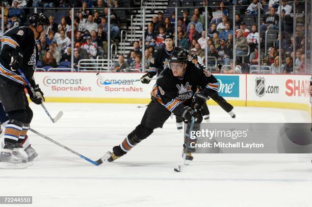 Alexander Ovechkin of the Washington Capitals skates with the puck against the Atlanta Thrashers at the Verizon Center on October 14, 2006 in...