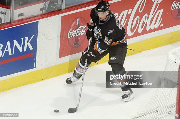 Richard Zednik of the Washington Capitals skates with the puck against the Atlanta Thrashers at the Verizon Center on October 14, 2006 in Washington,...