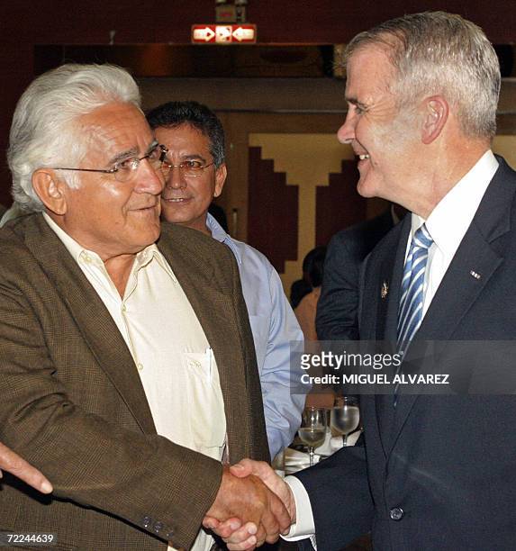 Former sandinista guerrillas leader "Commander Zero" and presidential candidate for the Alliance for a Change Eden Pastora shakes hands with US Army...