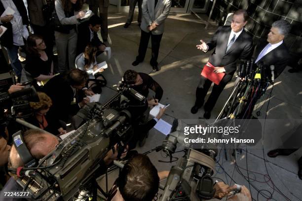 Former Enron Chief Executive Jeffrey Skilling and his attorney Dan Petrocelli talk to the media outside the Bob Casey United States Court House...