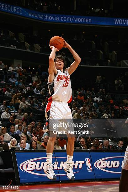 Adam Morrison of the Charlotte Bobcats shoots a jump shot during a preseason game against the Milwaukee Bucks at Charlotte Bobcats Arena on October...