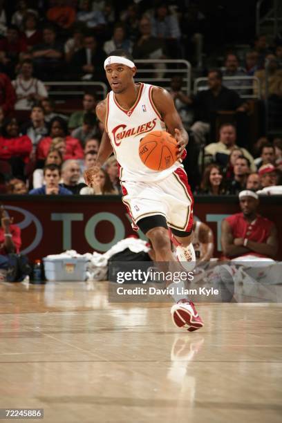 Daniel Gibson of the Cleveland Cavaliers moves the ball up court during a preseason game against Maccabi Elite Tel Aviv at The Quicken Loans Arena on...