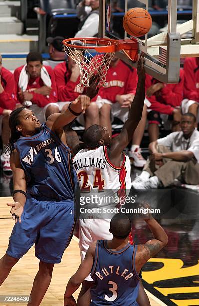 Marvin Williams of the Atlanta Hawks drives to the basket against Etan Thomas of the Washington Wizards at Philips Arena on October 23, 2006 in...