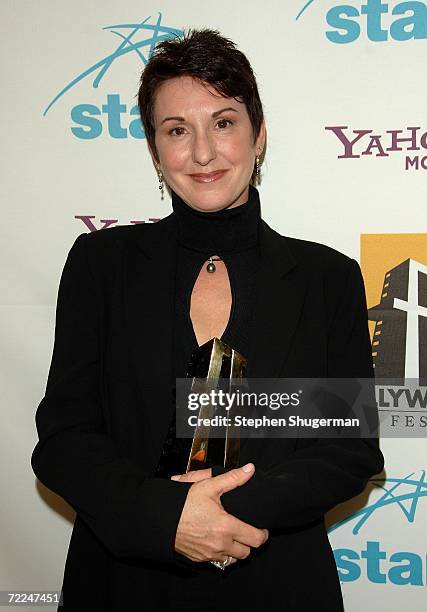 Make-up artist Kris Evans poses with the Hollywood Make-up of the Year award poses in the press room at The Hollywood Film Festival 10th Annual...