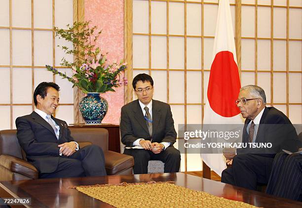 Visiting Indian National Security adviser M.K. Narayanan hold talks with Japanese Foreign Minister Taro Aso in Tokyo 24 October 2006. Narayanan is...