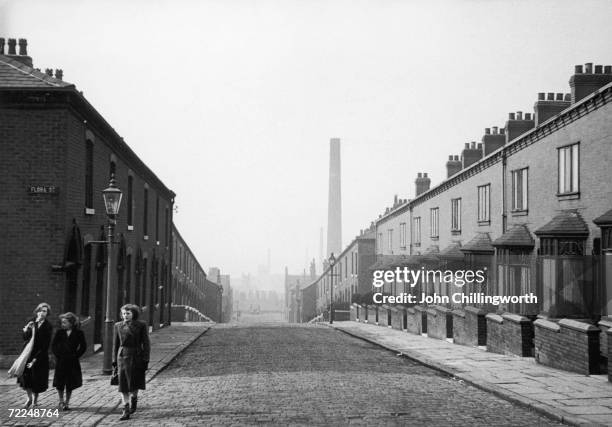 View down a terraced street in Rochdale, Lancashire, April 1952. Original Publication: Picture Post - 5825 - The Crisis In Cotton - pub. 1952