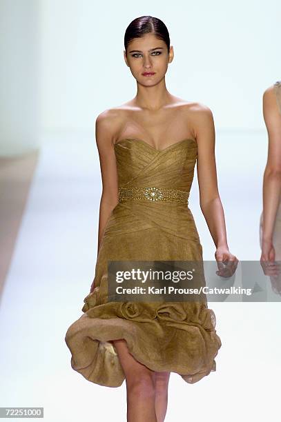 Model walks the runway at the Monique Lhuillier Spring 2007 fashion show during Olympus Fashion Week in the Promenade tent in Bryant Park September...