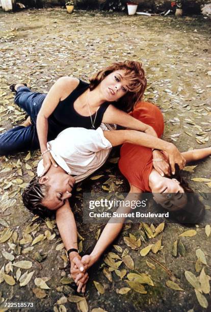 Melina Mercouri , Peter Finch and Romy Schneider on the set of '10:30 P.M. Summer', directed by Jules Dassin, 1965. This image was used on a poster...