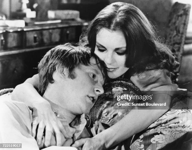 Romy Schneider and Dennis Waterman on the set of 'My Lover My Son', directed by John Newland, London, 1970.