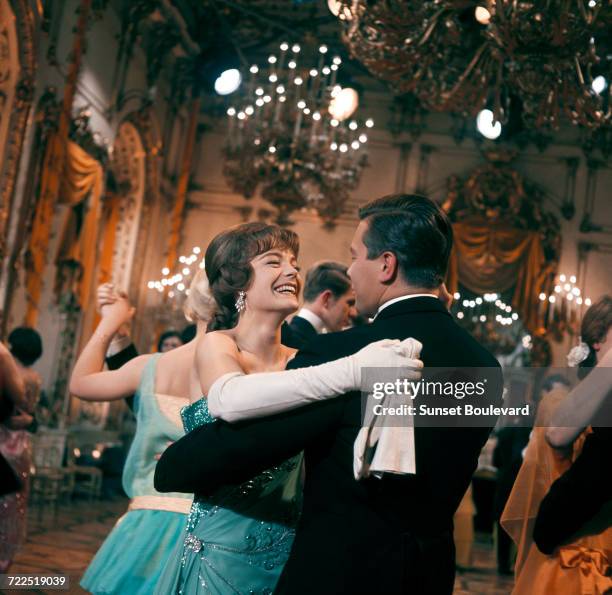 Romy Schneider and Peter Weck on the set of 'The Cardinal', directed by Otto Preminger, 1963.