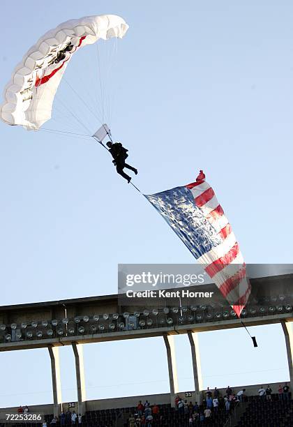 Member of the Air Force parachute jump team enters the stadium prior to the Air Force Falcons game against the San Diego State Aztecs on October 21,...