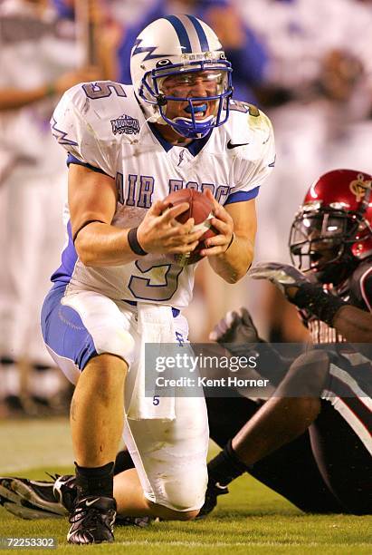 Quarterback Shaun Carney of the Air Force Falcons celebrates a play against the San Diego State Aztecs on October 21, 2006 during their game at...