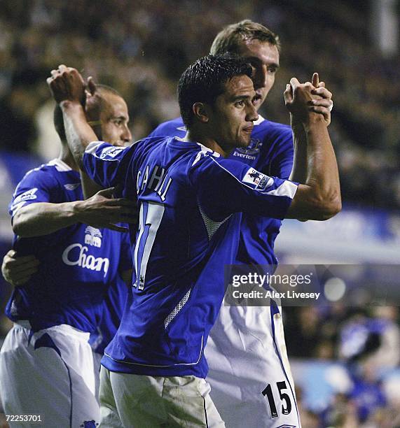 Tim Cahill of Everton celebrates with Alan Stubbs after scoring the opening goal during the Carling Cup third round match between Everton and Luton...