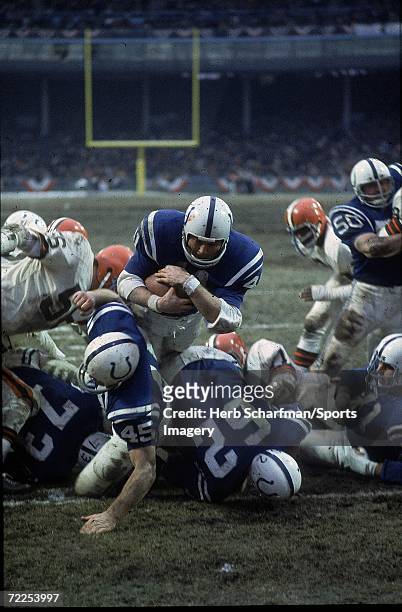 Tom Matte of the Baltimore Colts carries the ball against the Cleveland Browns in the 1968 Championbship Game at Municipal Stadium on January 4, 1970...