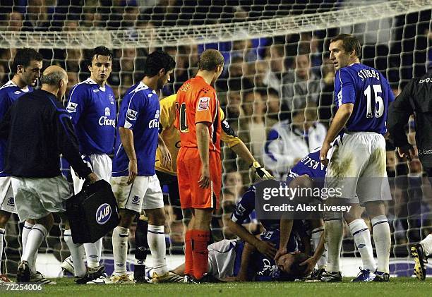 David Weir, the captain of Everton, lies injured during the Carling Cup third round match between Everton and Luton Town at Goodison Park on October...