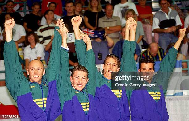 Phil Rogers, Steven Dewick, Chris Fydler and Scott Miller of Australia celebrate after winning the Mens 4x100m medley relay during the 1994...