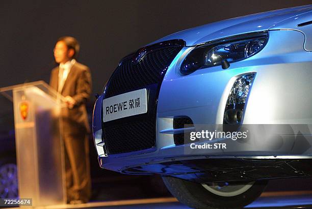 The "Roewe 750" model by Shanghai Automotive Industry Corp is introduced at a ceremony in Shanghai 24 October 2006. One of China's largest carmakers,...