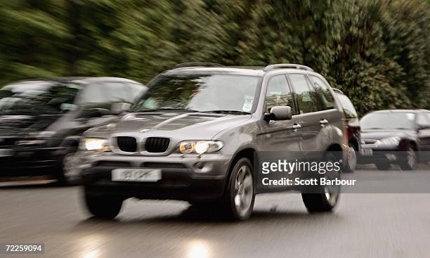 4x4 vehicle drives through central London on October 25, 2006 in London, England. Gas-guzzling vehicles are being targeted by local authorities to...