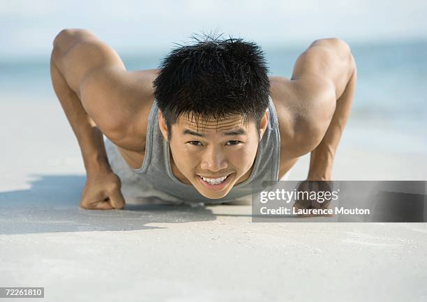 man doing push-ups on knuckles - knuckle stock pictures, royalty-free photos & images