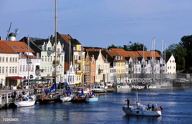 sailboats docked outside waterfront restaurants, sonderborg, denmark - jutland ストックフォトと画像