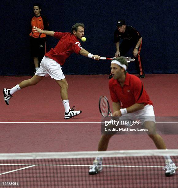 Yves Allegro of Switzerland and Robert Lindstedt of Sweden in action against David Ferrer and Albert Montanes of Spain during the ATP Davidoff Swiss...