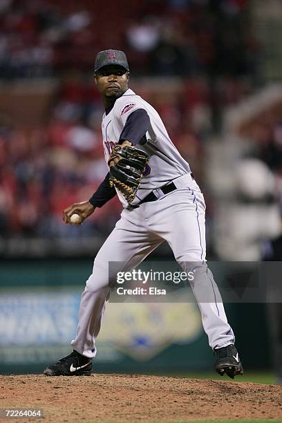 Guillermo Mota of the New York Mets throws a pitch against the St. Louis Cardinals during game four of the NLCS at Busch Stadium on October 15, 2006...