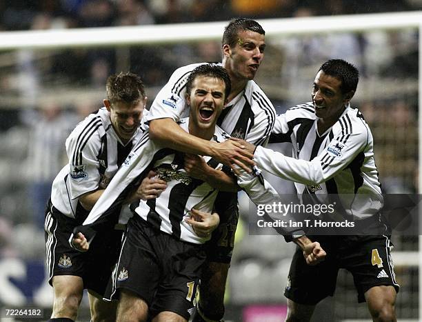 Giuseppe Rossi celebrates with teammates after scoring his first goal for United during the Carling Cup third round match between Newcastle United...