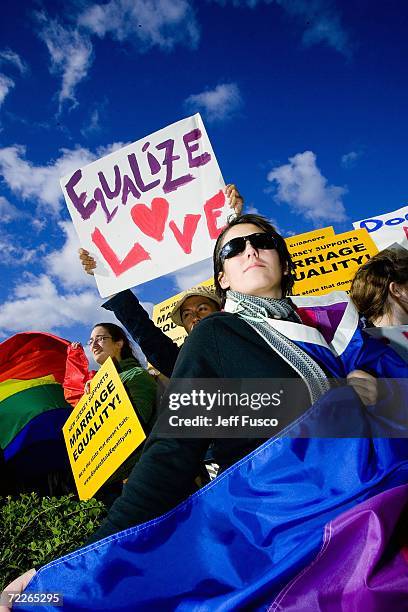 Supporters await the New Jersey Supreme court decision on same-sex marriage in front of the Supreme court building on October 25, 2006 in Trenton,...