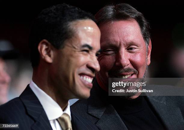 Oracle CEO Larry Ellison speaks with Oracle president Charles Phillips before delivering a keynote address at the 2006 Oracle OpenWorld conference...
