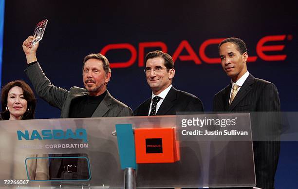 Oracle CFO Safra Catz, Oracle CEO Larry Ellison, Nasdaq CEO Robert Greifeld and Oracle president Charles Phillips close the Nasdaq market before...