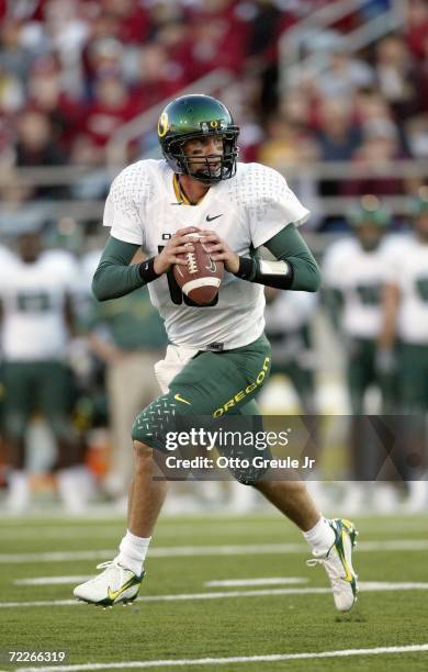 Quarterback Brady Leaf of the Oregon Ducks rolls out against the Washington State Cougars on October 21, 2006 at Martin Stadium in Pullman,...