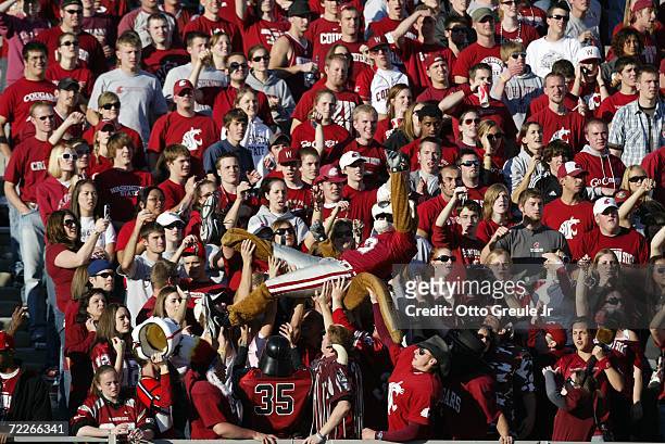Washington State Cougars fans and their mascot cheer during the game against the Oregon Ducks on October 21, 2006 at Martin Stadium in Pullman,...
