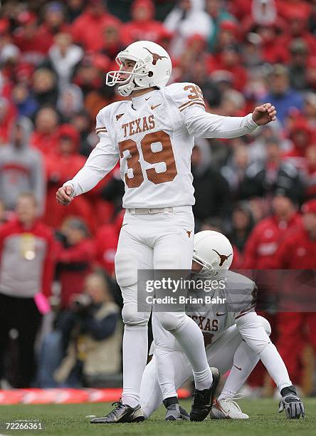 Ryan Bailey of the Texas Longhorns watches the ball on his field goal attempt against the Nebraska Cornhuskers on October 21, 2006 at Memorial...