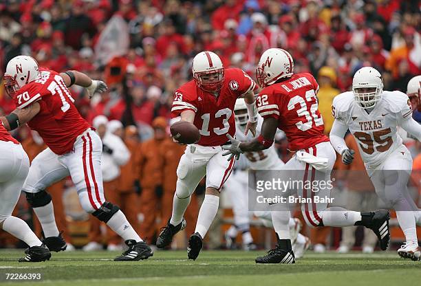 Quarterback Zac Taylor of the Nebraska Cornhuskers looks to hand the ball off to Brandon Jackson during the game against the Texas Longhorns on...