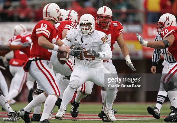 Defensive tackle Roy Miller of the Texas Longhorns pressures quarterback Zac Taylor of the Nebraska Cornhuskers during the game against on October...
