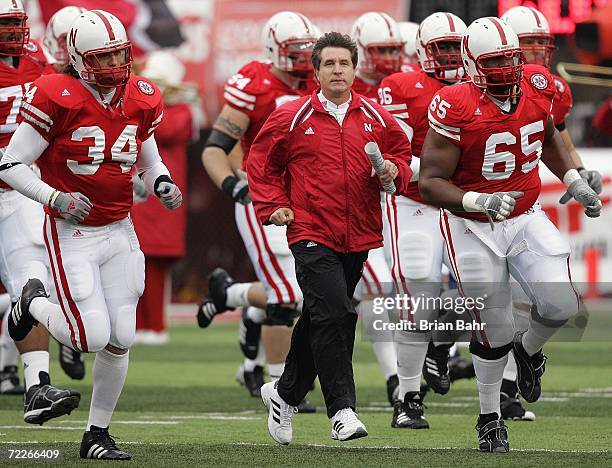 Head Coach Bill Callahan of the Nebraska Cornhuskers jogs on the field with his team as they host the Texas Longhorns on October 21, 2006 at Memorial...