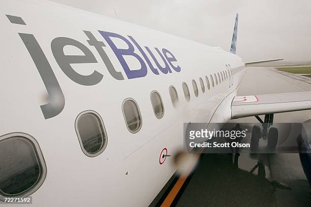 JetBlue Airways jet sits on the tarmac at O'Hare Airport October 26, 2006 in Chicago, Illinois. JetBlue today announced the start of service to the...
