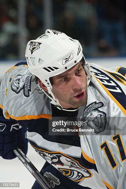 David Legwand of the Nashville Predators lines up in position to take the faceoff against the New York Islanders on October 16, 2006 at Nassau...