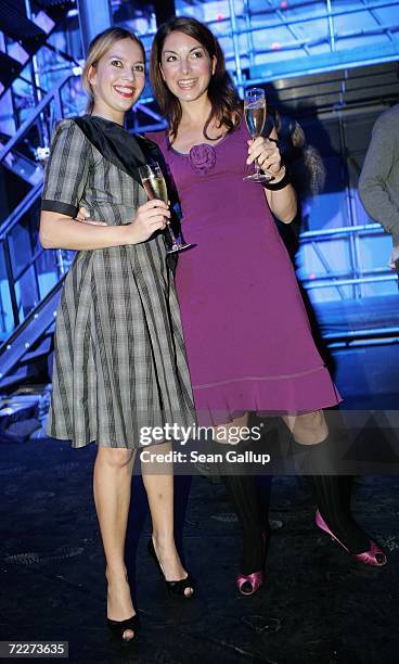 Actresses Laura Osswald and Bianca Hein attend the Moet & Chandon Fashion Debut at the Admiralspalast October 26, 2006 in Berlin, Germany.