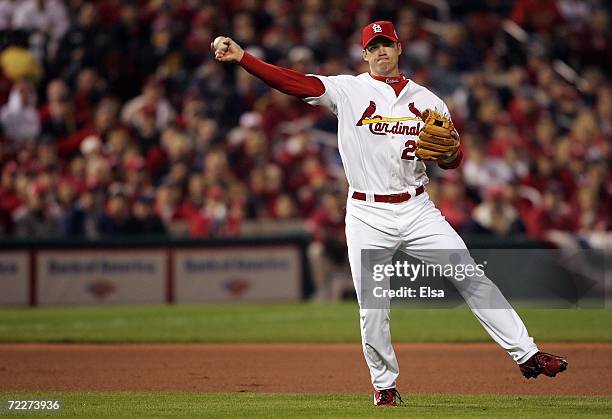 Scott Rolen of the St. Louis Cardinals fields a ball against the Detroit Tigers during Game Four of the 2006 World Series on October 26, 2006 at...