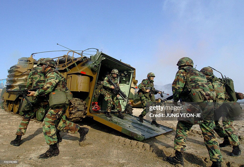 South Korean marines prepare to take pos