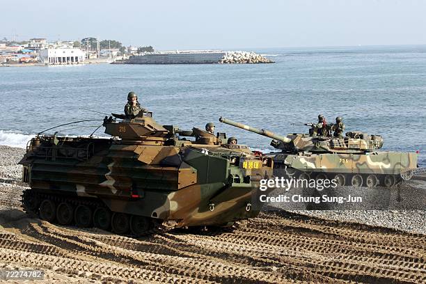 South Korean tanks moves into position during a landing operations for possible threats from North Korea at Pohang beach on October 27, 2006 in...