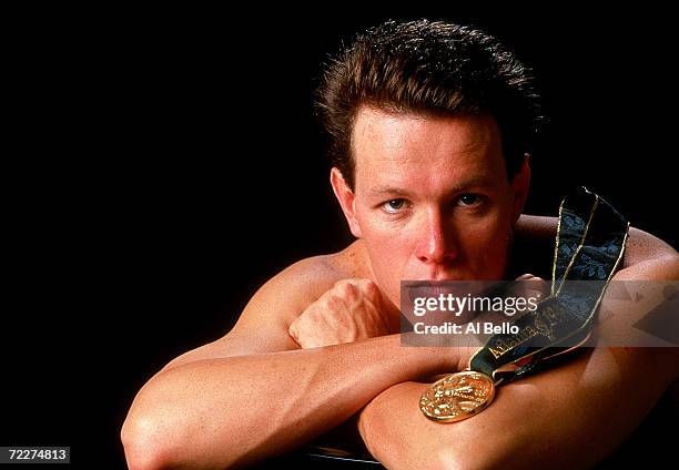 Olympic gold medalist Kieren Perkins of Australia poses with his medal during the 1996 Olympic Games held in Atlanta, USA. Perkins won gold in the...