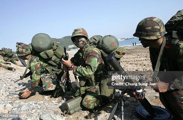 South Korean marines take part in landing exercises in preparation for possible threats from North Korea at Pohang beach on October 27, 2006 in...