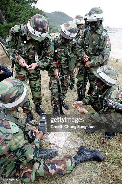 South Korean marines take part in landing exercises in preparation for possible threats from North Korea at Pohang beach on October 26, 2006 in...